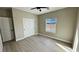 Bright bedroom boasts hardwood floors and closet with sliding doors at 1131 Lupin St, Pahrump, NV 89048