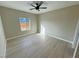 Bedroom with hardwood floors and bright natural light at 1131 Lupin St, Pahrump, NV 89048