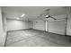 Spacious three-car garage with concrete floor and automated door openers at 1131 Lupin St, Pahrump, NV 89048