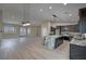 Well-appointed kitchen with granite countertops, an island, and stainless appliances at 1131 Lupin St, Pahrump, NV 89048