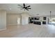 Open concept living room to the kitchen, with lots of room to entertain at 1131 Lupin St, Pahrump, NV 89048