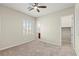 Bedroom featuring neutral carpet, ceiling fan, recessed lighting and a walk-in closet at 11843 Cogoleto Ave, Las Vegas, NV 89138