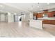 Open-concept living space featuring tile floors, a ceiling fan, and sliding glass doors at 11843 Cogoleto Ave, Las Vegas, NV 89138