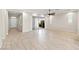 Inviting living room with tile flooring, recessed lights, and easy access to outdoor patio at 11843 Cogoleto Ave, Las Vegas, NV 89138