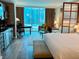 Modern studio with comfortable seating and a view of the city at 125 E Harmon Ave # 1003, Las Vegas, NV 89109