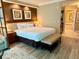 Inviting bedroom with a king-size bed and bathroom access at 125 E Harmon Ave # 1003, Las Vegas, NV 89109