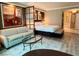 Sophisticated bedroom with a lounge, king bed, and bath at 125 E Harmon Ave # 1003, Las Vegas, NV 89109