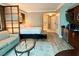 Comfortable living space with a bed, couch, and a kitchenette for a convenient stay at 125 E Harmon Ave # 1003, Las Vegas, NV 89109