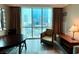 Inviting living space with expansive windows offering panoramic city views and natural light at 125 E Harmon Ave # 1003, Las Vegas, NV 89109