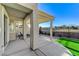 Covered patio area with views of a well-maintained backyard at 1317 Fox Acres Dr, Las Vegas, NV 89134
