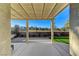Covered patio area that has a view of a well-maintained yard and mountain landscape at 1317 Fox Acres Dr, Las Vegas, NV 89134