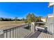Beautiful view from the balcony overlooking the golf course and mature landscaping at 1317 Fox Acres Dr, Las Vegas, NV 89134