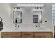 This bathroom features a double sink vanity with black hardware and updated fixtures at 1317 Fox Acres Dr, Las Vegas, NV 89134