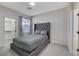 Well-lit bedroom boasts carpet flooring, and an inviting aesthetic at 1317 Fox Acres Dr, Las Vegas, NV 89134