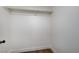 Well-organized closet with a single rack and sleek wood-look flooring at 1317 Fox Acres Dr, Las Vegas, NV 89134