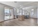 Open dining area with backyard access, stylish cabinets, and a contemporary chandelier, blending indoor and outdoor living at 1317 Fox Acres Dr, Las Vegas, NV 89134