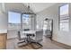 Cozy dining area features modern furniture, natural light, and scenic mountain views for a relaxed atmosphere at 1317 Fox Acres Dr, Las Vegas, NV 89134