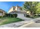 Charming two-story home with a spacious driveway, manicured landscaping, and a welcoming curb appeal at 1317 Fox Acres Dr, Las Vegas, NV 89134