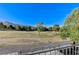 Picturesque golf course view with mature trees, offering a tranquil and inviting outdoor space at 1317 Fox Acres Dr, Las Vegas, NV 89134