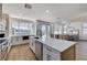 Spacious kitchen featuring bright countertops, stainless steel appliances, and an open layout with scenic backyard views at 1317 Fox Acres Dr, Las Vegas, NV 89134