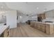 Open-concept living space seamlessly connects the living room, dining area, and kitchen for easy entertaining at 1317 Fox Acres Dr, Las Vegas, NV 89134