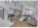 Bright and spacious living room featuring high ceilings and a modern fireplace at 1317 Fox Acres Dr, Las Vegas, NV 89134