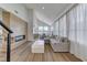 Bright open floor plan with wood-style floors, fireplace feature, and natural light at 1317 Fox Acres Dr, Las Vegas, NV 89134