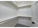 Spacious walk-in closet with shelves, great for storing clothes and accessories at 1317 Fox Acres Dr, Las Vegas, NV 89134