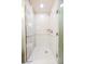 The bathroom features a stand up shower, updated fixtures and a neutral color palette at 145 Harmon Ave # 1021, Las Vegas, NV 89109
