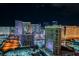 Stunning night view of the city with brightly lit hotels and entertainment venues at 145 Harmon Ave # 1021, Las Vegas, NV 89109