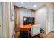 Dedicated desk area with chair and storage cabinets at 145 Harmon Ave # 1021, Las Vegas, NV 89109