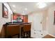 Cozy kitchen with a breakfast bar featuring granite counters and stainless steel appliances at 145 Harmon Ave # 1021, Las Vegas, NV 89109