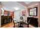 Charming kitchen features an eat-in bar, wooden cabinetry, and glass table with chairs at 145 Harmon Ave # 1021, Las Vegas, NV 89109