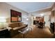 Cozy living room featuring comfortable seating and open access to the kitchenette at 145 Harmon Ave # 1021, Las Vegas, NV 89109