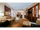 Spacious living room with comfortable seating, a glass table, and open access to the kitchen at 145 Harmon Ave # 1021, Las Vegas, NV 89109