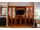 Beautiful living room featuring a built-in entertainment center, creating a cozy and organized space at 145 Harmon Ave # 1021, Las Vegas, NV 89109