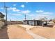 A spacious backyard view with partial fencing and partial block walls at 1520 Teton St, Las Vegas, NV 89101