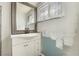 This bathroom features a mirror, vanity, sink, and medicine cabinet at 1520 Teton St, Las Vegas, NV 89101