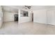 Open-concept living area with tiled floors and a pass-through to the kitchen at 1520 Teton St, Las Vegas, NV 89101