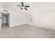 Spacious living room with tiled floors and ceiling fan at 1520 Teton St, Las Vegas, NV 89101