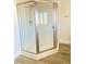 Walk-in shower with glass enclosure, complemented by modern fixtures and a neutral color palette at 172 Tall Ruff Dr, Las Vegas, NV 89148
