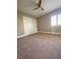 Bedroom with a closet, carpet, base trim, and a window for natural light at 172 Tall Ruff Dr, Las Vegas, NV 89148