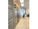 Bright break room featuring multiple stainless steel refrigerators and tile flooring at 172 Tall Ruff Dr, Las Vegas, NV 89148