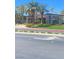 Community center building exterior with attractive landscaping and architecture on a bright sunny day at 172 Tall Ruff Dr, Las Vegas, NV 89148