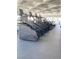 Row of stair stepper machines in the gym at 172 Tall Ruff Dr, Las Vegas, NV 89148