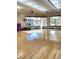 Spacious gym area with wood floors, exercise balls, and natural light from the many windows at 172 Tall Ruff Dr, Las Vegas, NV 89148