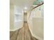 Hallway with a staircase and a built-in bookshelf at 172 Tall Ruff Dr, Las Vegas, NV 89148