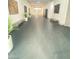 Inviting hallway area with several plants and built-in benches at 172 Tall Ruff Dr, Las Vegas, NV 89148