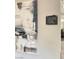 Hallway signage directing to arts and crafts, kitchen, billiards, and card room at 172 Tall Ruff Dr, Las Vegas, NV 89148