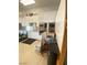 Spacious kitchen with stainless steel appliances, white cabinets, and light tile flooring at 172 Tall Ruff Dr, Las Vegas, NV 89148